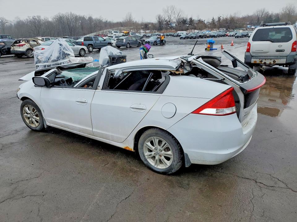 2010 Honda Insight VIN JHMZE2H73AS012881 COPART salvage auction — ALL OVER, Ct - Cert Of Title-Salvage, sold $450 on 2026-07-24 (photo 2)
