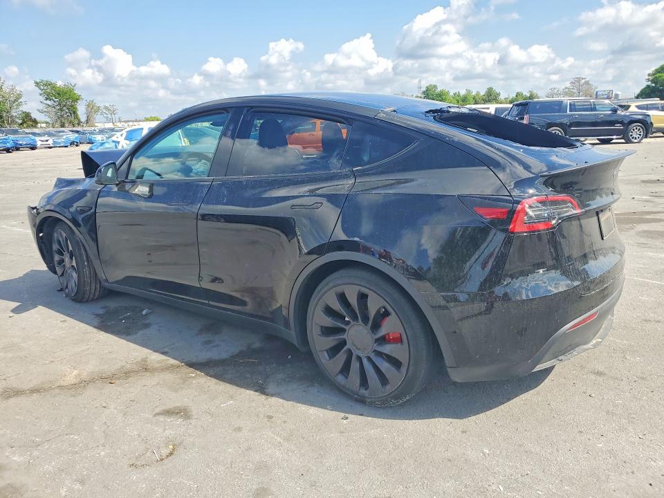 2025 Tesla Model y VIN 7SAYGDEF8SA348250 COPART salvage auction — FRONT END, FL, sold $13,500 on 2026-07-14 (photo 2)
