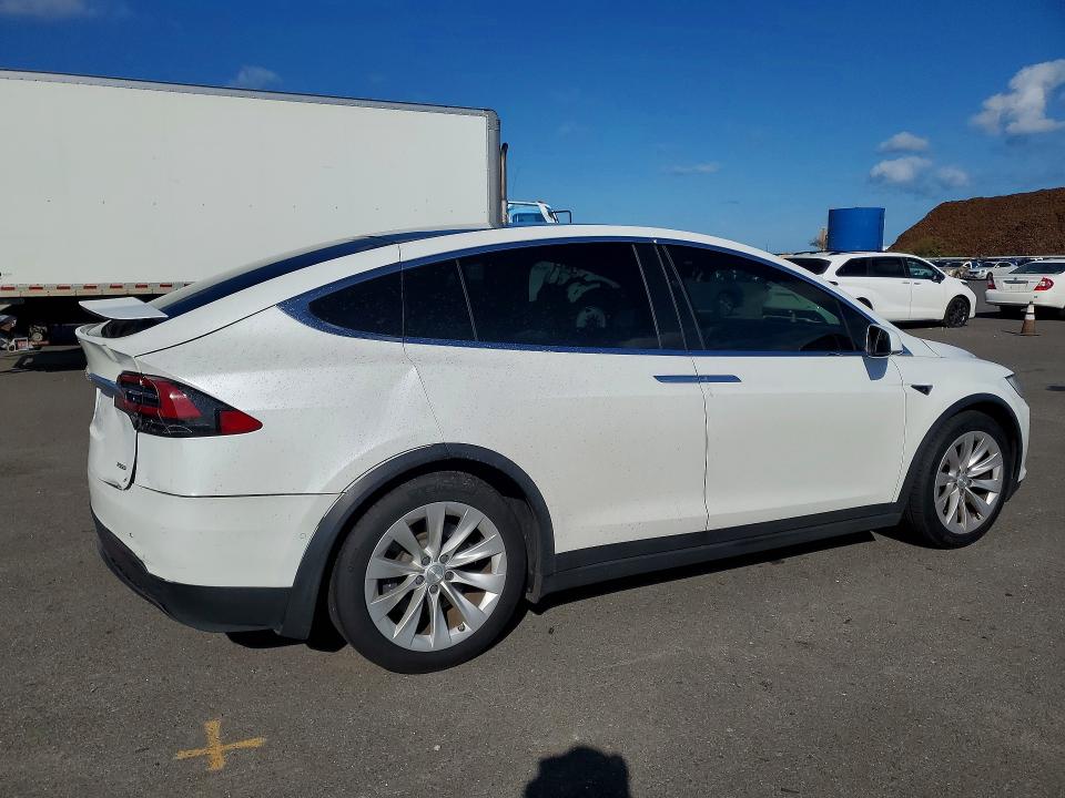 2017 Tesla Model x VIN 5YJXCAE26HF057192 COPART salvage auction — REAR END, Hi - Certificate Of Title, sold $150 on 2026-06-29 (photo 3)