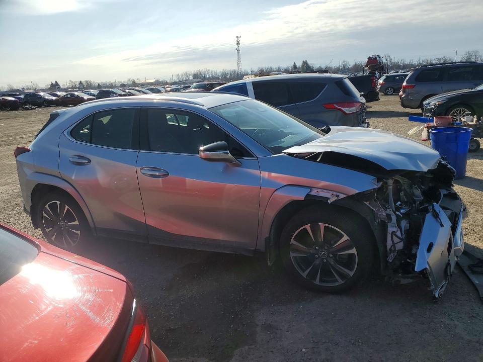 2025 Lexus Ux VIN JTHUCJDH7S2003949 COPART salvage auction — FRONT END, Salvage Title, sold $14,200 on 2026-07-14 (photo 4)