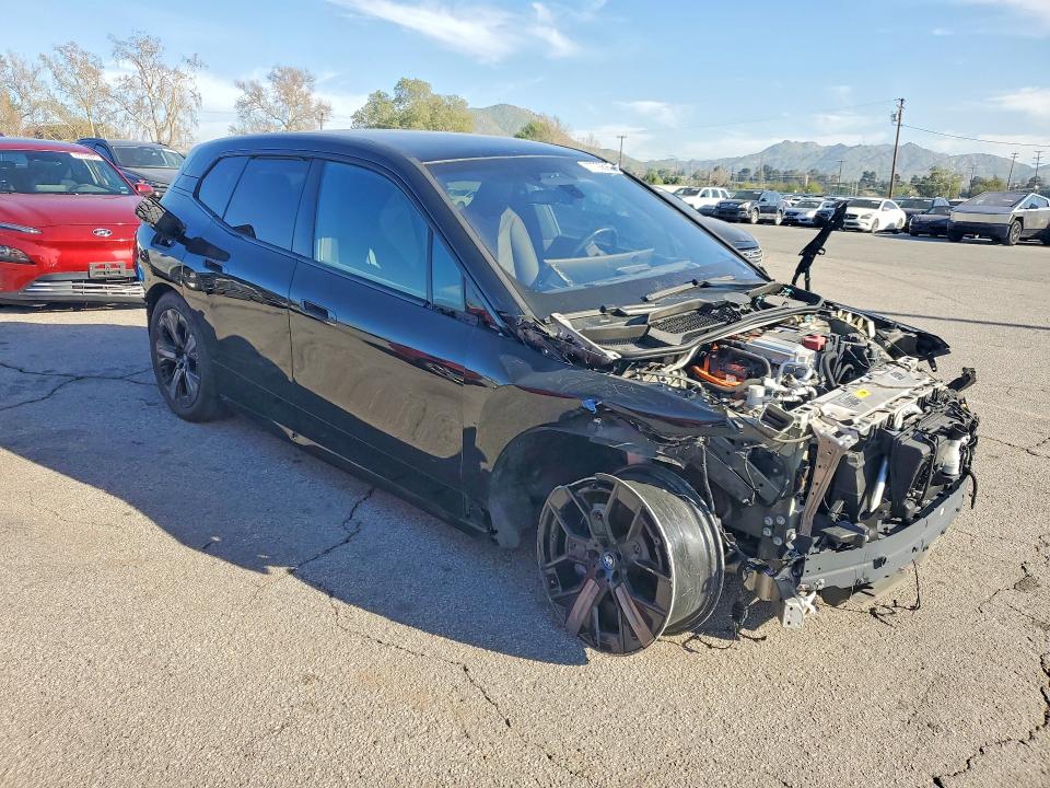 2024 BMW Ix VIN WB523CF04RCN52035 COPART salvage auction — FRONT END, Ca - Dis/Dlr/Exp Only Clean Title, sold $18,500 on 2026-07-20 (photo 4)