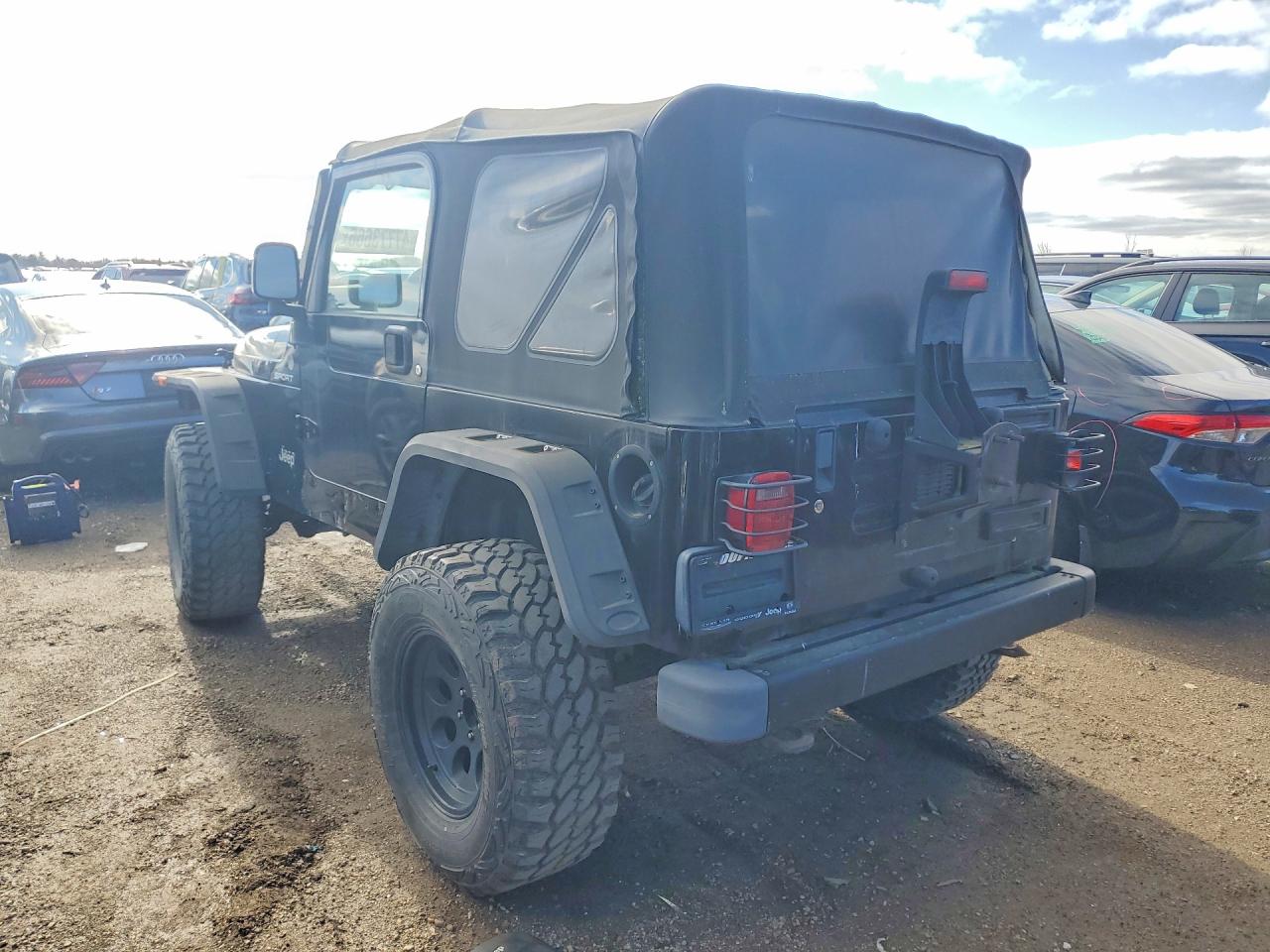 2004 Jeep Wrangler VIN 1J4FA49S84P801236 COPART salvage auction — Minor Dent/Scratches, IL - CERT OF TITLE-REBUILT, sold $2,950 on 2026-07-09 (photo 2)