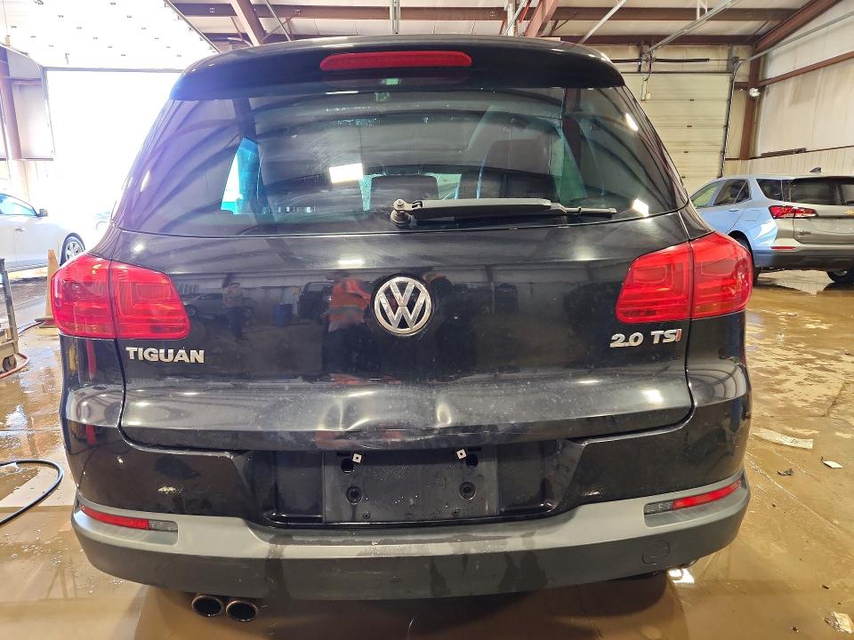 2014 Volkswagen Tiguan VIN WVGAV3AX2EW597977 COPART salvage auction — FRONT END, Salvage Title, sold $400 on 2026-07-17 (photo 6)