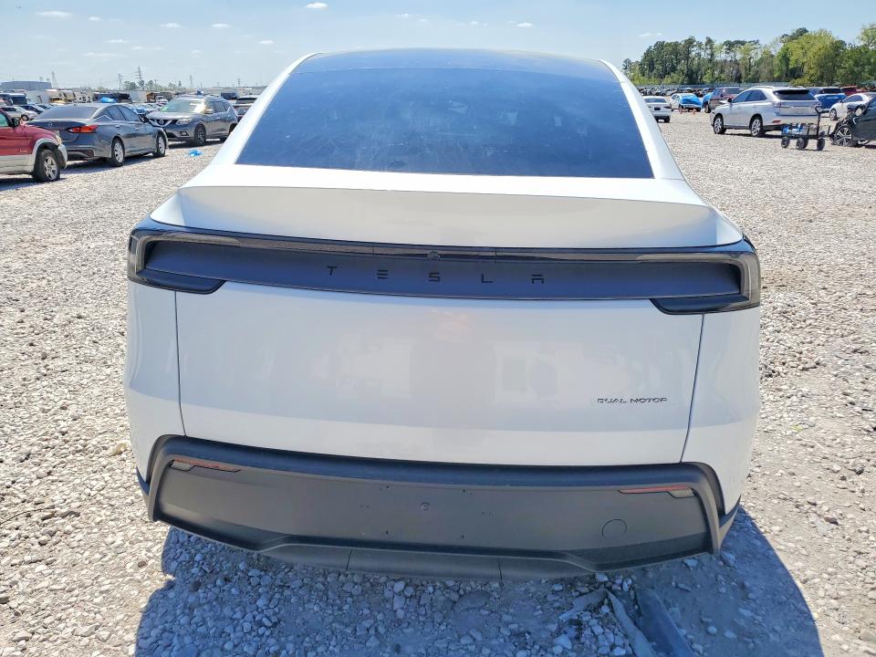 2026 Tesla Model y VIN 7SAYGDEE4TA449584 COPART salvage auction — SIDE, Tx - Certificate Of Title, sold $20,800 on 2026-09-22 (photo 6)