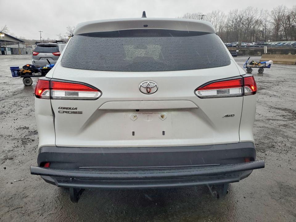 2022 Toyota Corolla cross VIN 7MUAAABG4NV023504 COPART salvage auction — SIDE, Id - Salvage Certificate Of Title, sold $7,600 on 2026-07-28 (photo 6)