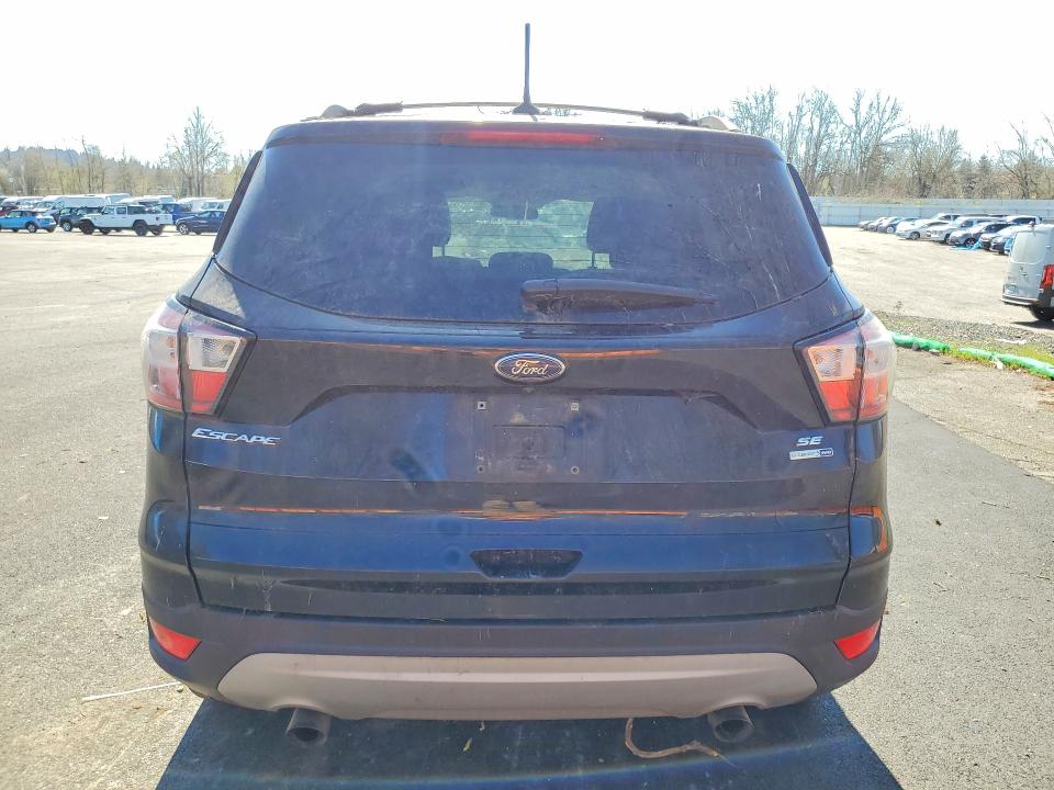 2018 Ford Escape VIN 1FMCU9GD8JUA86811 COPART salvage auction — Rear End, WV - CERTIFICATE OF TITLE, sold $475 on 2026-04-09 (photo 6)