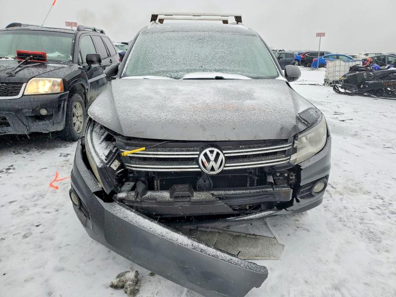 2015 Volkswagen Tiguan VIN WVGJV7AX2FW521927 COPART salvage auction — FRONT END, Qc - Gravement Accidente, sold $150 on 2026-07-21 (photo 5)