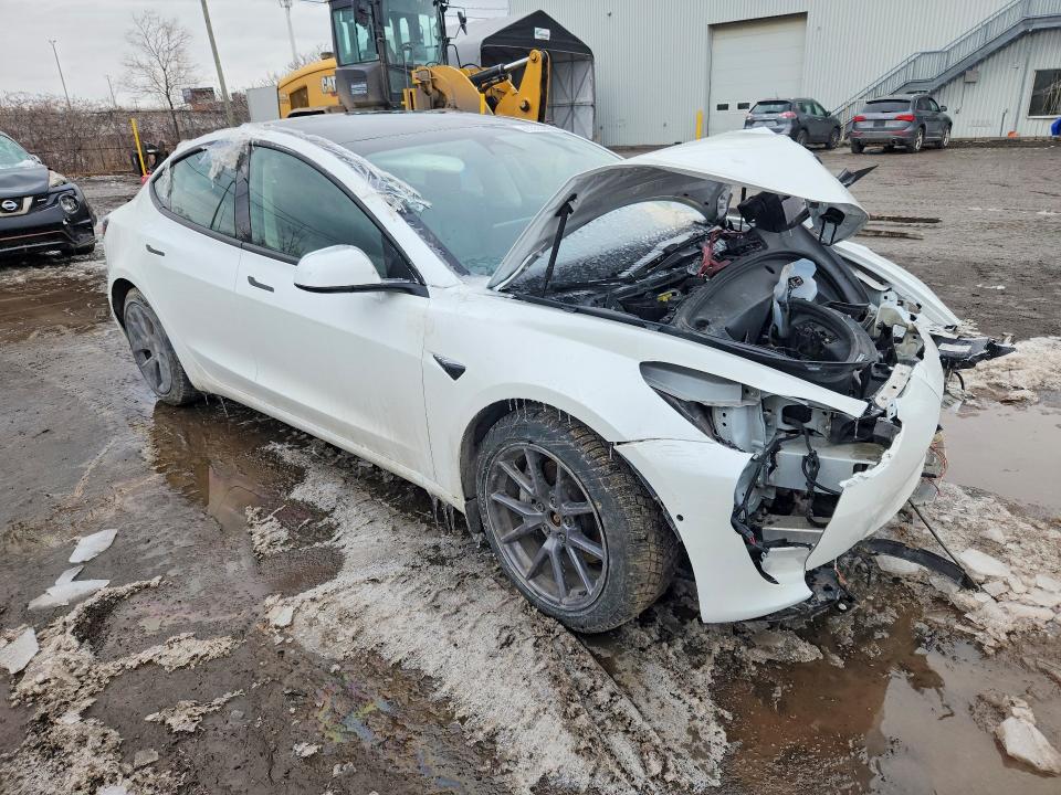 2022 Tesla Model 3 VIN 5YJ3E1EB1NF271124 COPART salvage auction — FRONT END, Qc - Gravement Accidente, sold $4,100 on 2026-07-07 (photo 4)