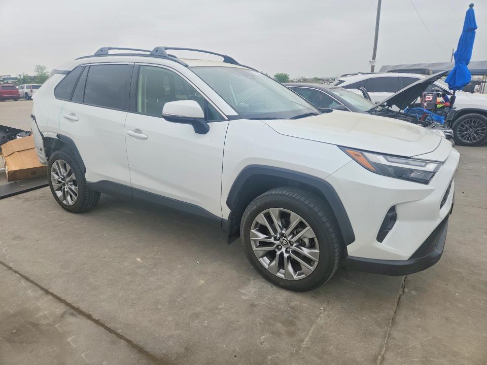 2023 Toyota Rav 4 VIN JTMC1RFV2PD112285 COPART salvage auction — REAR END, TX - SALVAGE VEHICLE TITLE, sold $16,600 on 2026-10-12 (photo 4)