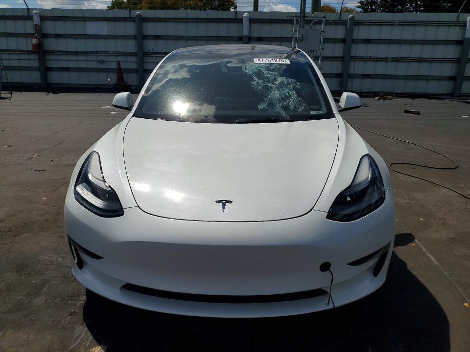 2023 Tesla Model 3 VIN 5YJ3E1EA9PF554834 COPART salvage auction — REAR END, Fl - Cert Of Title Slvg Rebuildable, sold $3,100 on 2026-07-13 (photo 5)