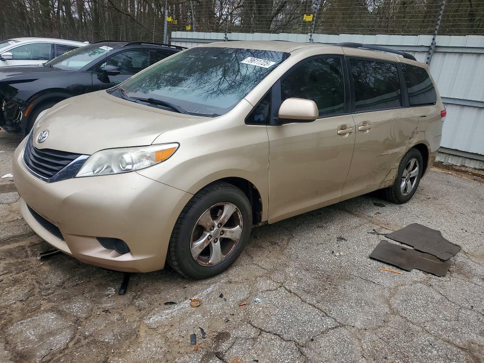 2014 Toyota Sienna VIN 5TDKK3DC7ES408069 COPART salvage auction — NORMAL WEAR, Fl - Cert Of Title Slvg Rebuildable, sold $3,000 on 2026-07-31 (photo 1)