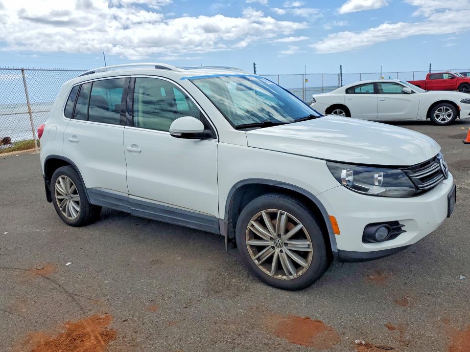 2014 Volkswagen Tiguan VIN WVGAV3AX0EW600150 COPART salvage auction — WATER/FLOOD, Hi - Certificate Of Salvage, sold $2 on 2026-08-10 (photo 4)