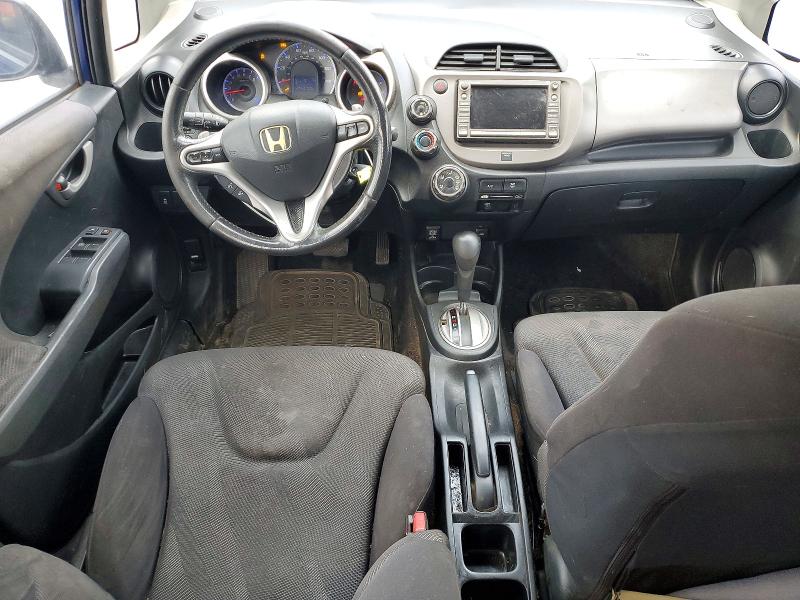 2009 Honda Fit VIN JHMGE886X9S056423 COPART salvage auction — SIDE, GA - CERT OF TITLE-SALVAGE, sold $575 on 2026-07-09 (photo 8)