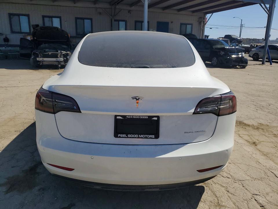 2021 Tesla Model 3 VIN 5YJ3E1EB7MF049640 COPART salvage auction — WATER/FLOOD, Ca - Salvage Certificate, sold $10,100 on 2026-07-27 (photo 6)