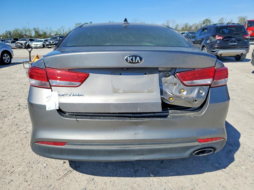 2016 Kia Optima VIN 5XXGU4L32GG045093 COPART salvage auction — ENGINE BURN, Tx - Salvage Vehicle Title, sold $200 on 2026-07-02 (photo 6)