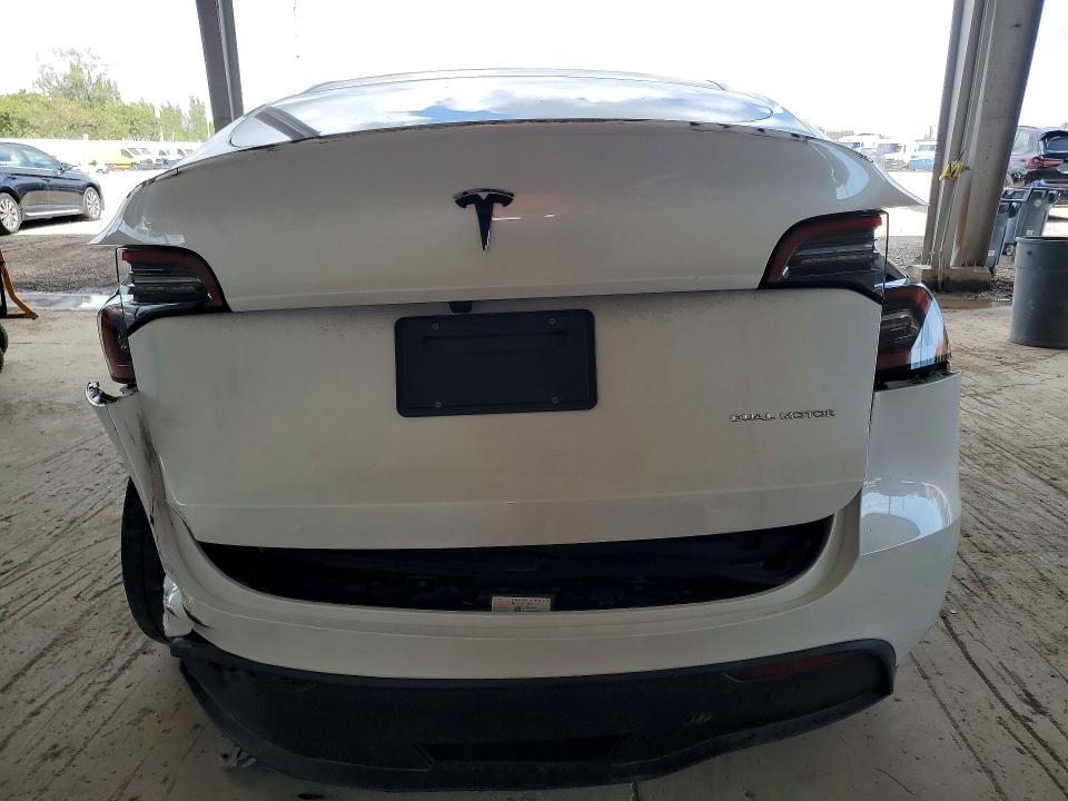 2024 Tesla Model y VIN 7SAYGDEEXRA263976 COPART salvage auction — REAR END, Salvage Title, sold $8,200 on 2026-07-22 (photo 6)