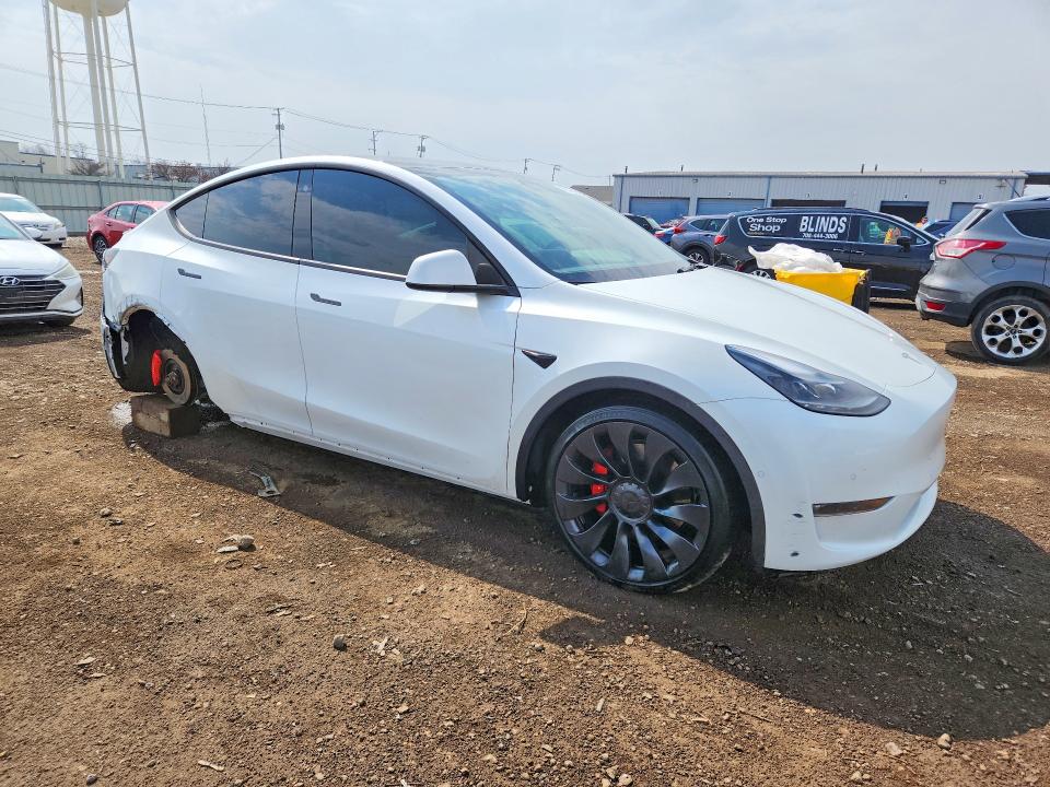 2022 Tesla Model y VIN 7SAYGDEF5NF454114 COPART salvage auction — REAR END, Il - Salvage Certificate, sold $11,700 on 2026-07-17 (photo 4)