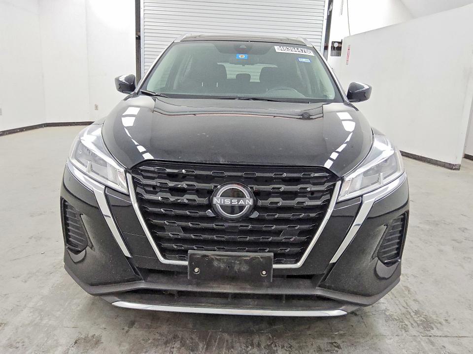 2023 Nissan Kicks VIN 3N1CP5CV6PL549781 COPART salvage auction — SIDE, In - Certificate Of Title, sold $12,500 on 2026-07-02 (photo 5)