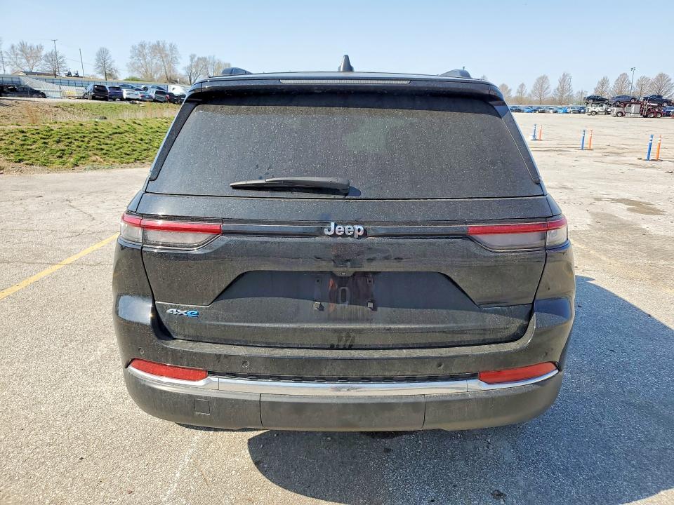 2022 Jeep Grand cherokee VIN 1C4RJYB60N8758322 COPART salvage auction — MINOR DENT/SCRATCHES, Mo - Certificate Of Title, sold $18,800 on 2026-07-09 (photo 6)