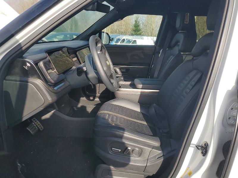 2023 Rivian R1s VIN 7PDSGABA4PN017518 COPART salvage auction — SIDE, Or - Salvage Title Certificate, sold $23,200 on 2026-07-13 (photo 7)