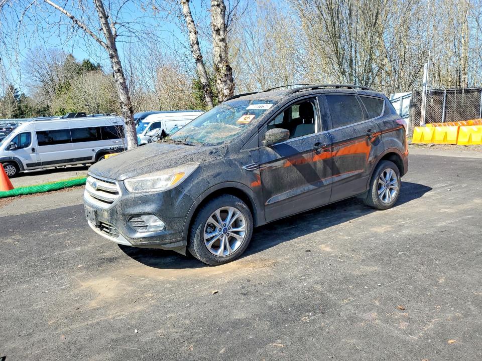 2018 Ford Escape VIN 1FMCU9GD8JUA86811 COPART salvage auction — Rear End, WV - CERTIFICATE OF TITLE, sold $475 on 2026-04-09 (photo 1)