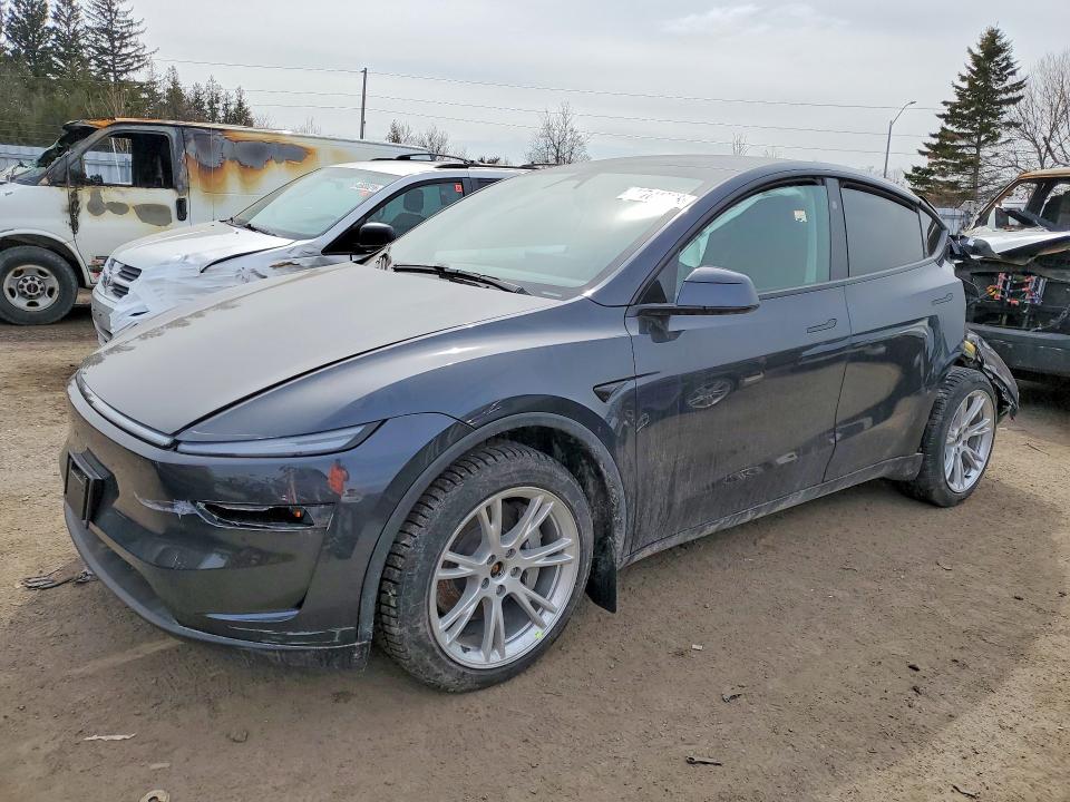 2026 Tesla Model y VIN XP7YGDEEXTB774125 COPART salvage auction — REAR END, On - Permit Salvage, sold $12,100 on 2026-08-04 (photo 1)