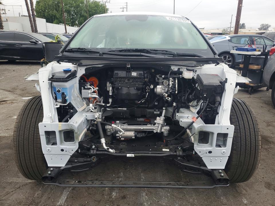 2025 Kia Ev6 VIN 5XYC34JA9SG013247 COPART salvage auction — STRIPPED, Ca - Certificate Of Title, sold $14,100 on 2026-07-02 (photo 5)