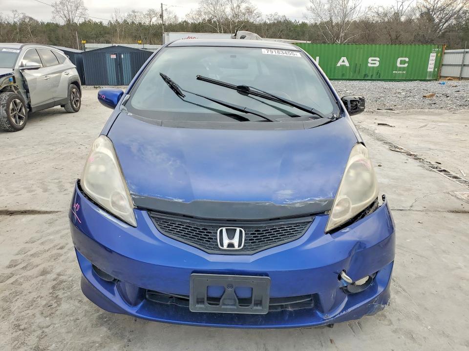 2009 Honda Fit VIN JHMGE886X9S056423 COPART salvage auction — SIDE, GA - CERT OF TITLE-SALVAGE, sold $575 on 2026-07-09 (photo 5)