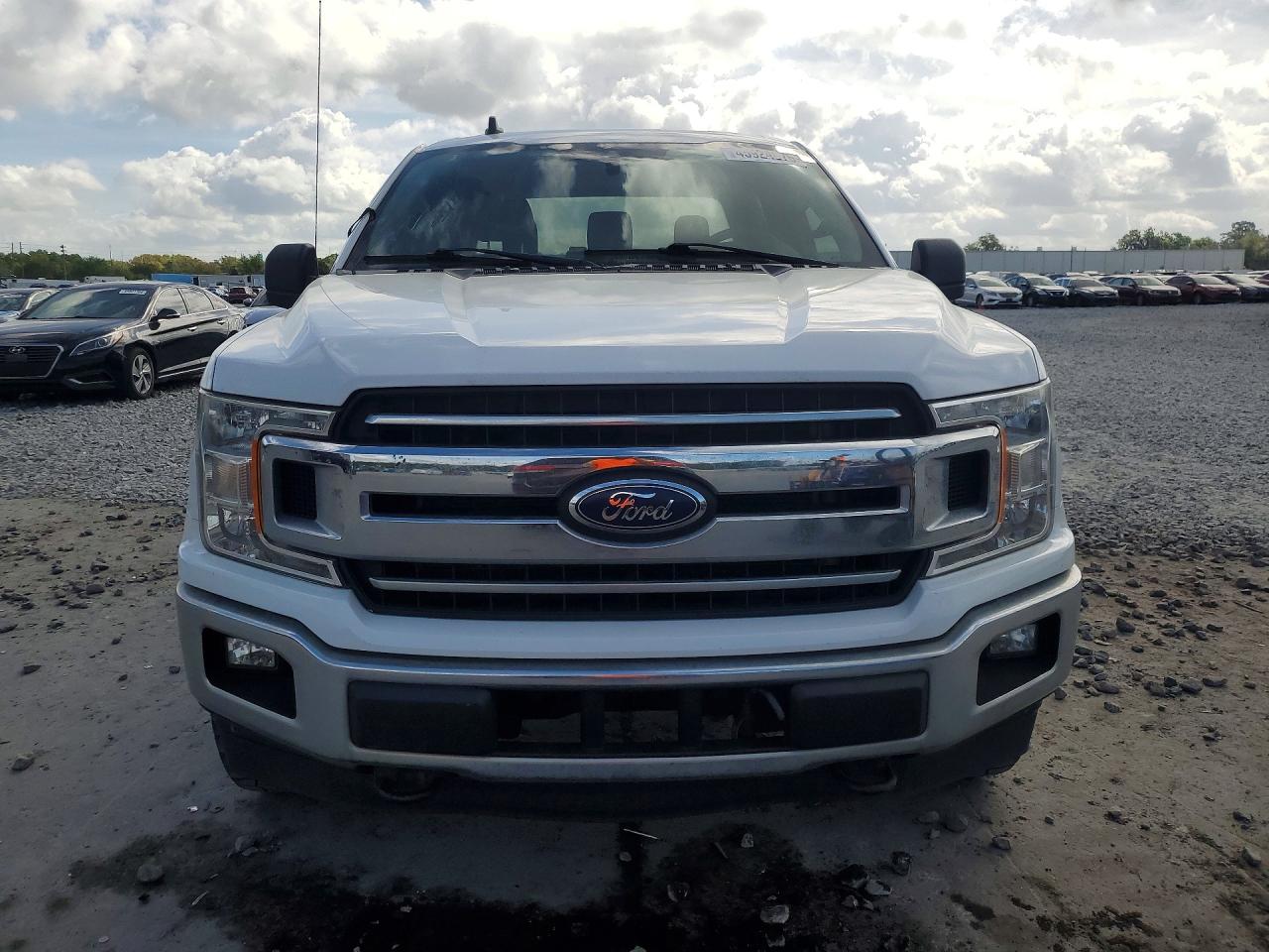 2020 Ford F-150 lightning VIN 1FTFW1E52LFA00232 COPART salvage auction — Normal Wear, FL - CERTIFICATE OF TITLE, sold $12,400 on 2026-06-29 (photo 5)