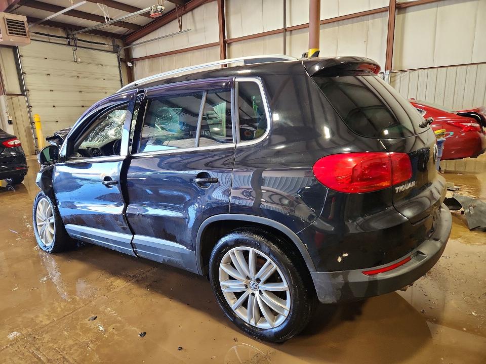 2014 Volkswagen Tiguan VIN WVGAV3AX2EW597977 COPART salvage auction — FRONT END, Salvage Title, sold $400 on 2026-07-17 (photo 2)