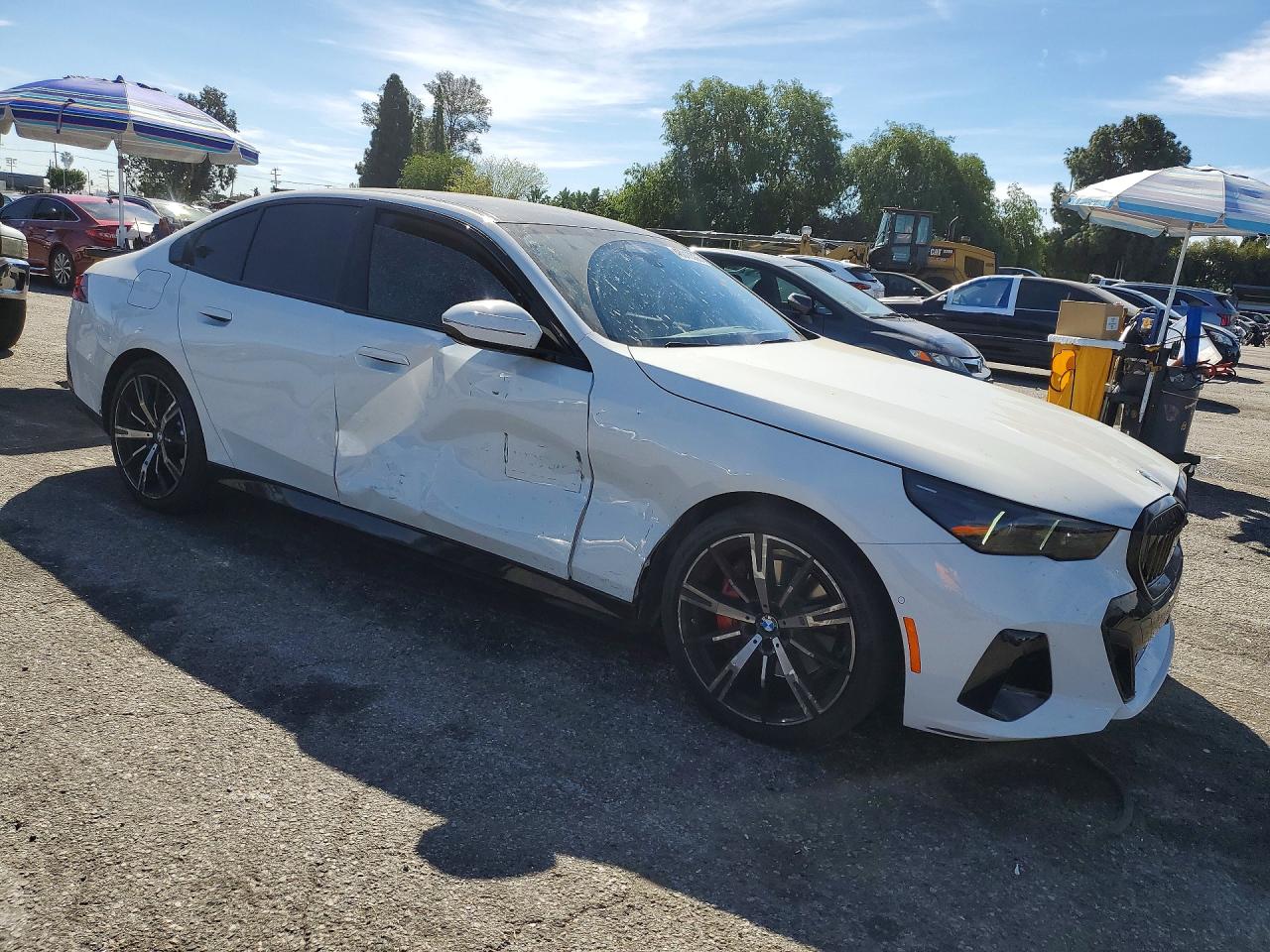 2024 BMW 5 Series VIN WBA43FJ07RCS27365 COPART salvage auction — Side, CA - SALVAGE CERTIFICATE, sold $37,750 on 2026-06-26 (photo 4)