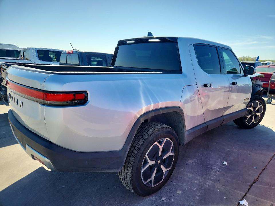 2023 Rivian R1t VIN 7FCTGAAA6PN021299 COPART salvage auction — FRONT END, TX - SALVAGE VEHICLE TITLE, sold $12,900 on 2026-07-09 (photo 3)