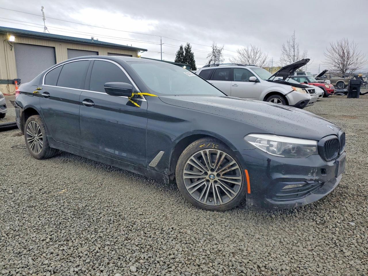 2018 BMW 5 Series VIN WBAJA5C55JWA57637 COPART salvage auction — Side, OR - SALVAGE TITLE CERTIFICATE, sold $4,250 on 2026-06-30 (photo 4)