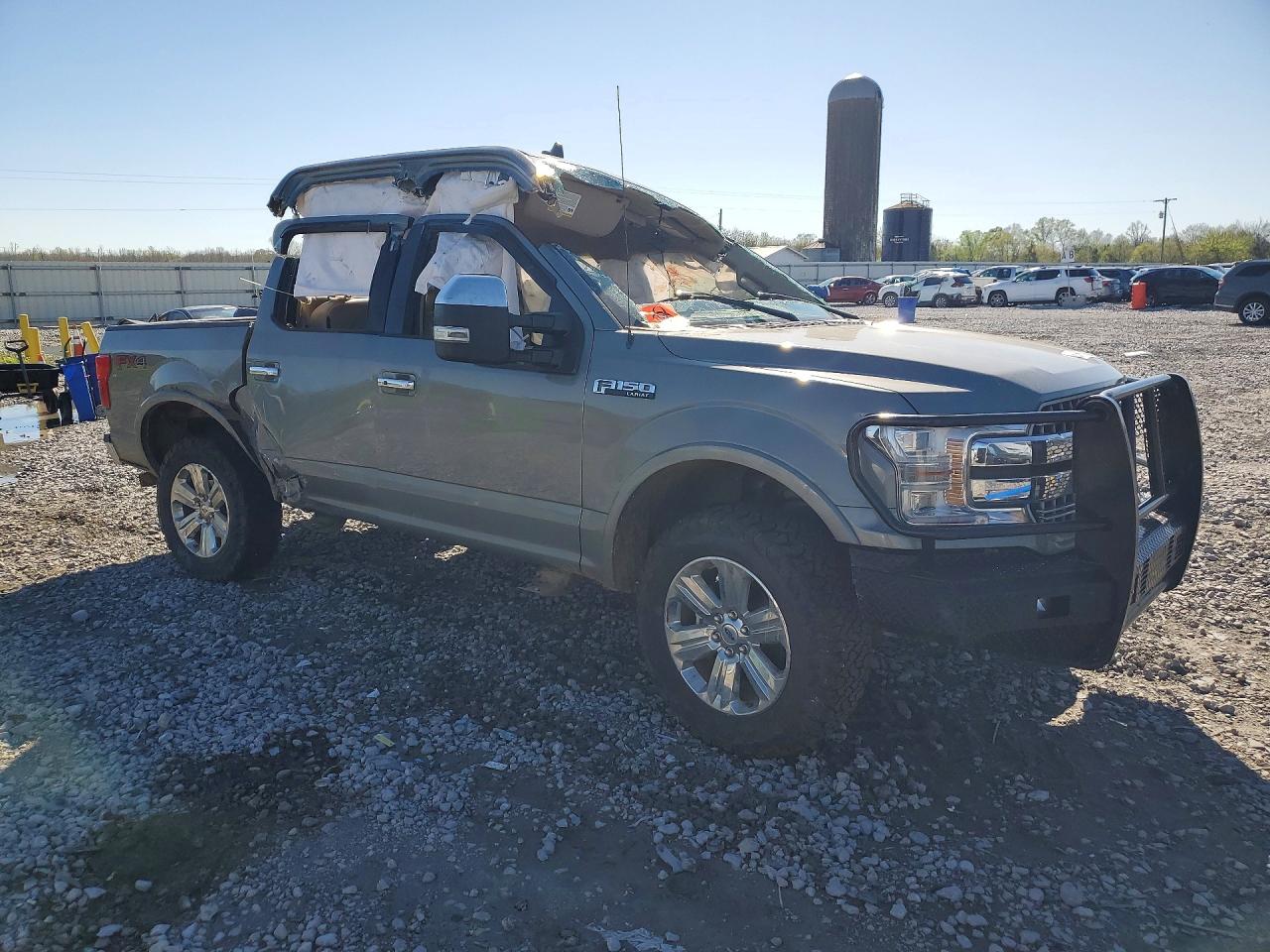 2020 Ford F-150 Lightning VIN 1FTEW1E56LKE70959 COPART salvage auction — All Over, AL - CERT OF TITLE-SALVAGE TITLE, sold $4,050 on 2026-07-09 (photo 4)