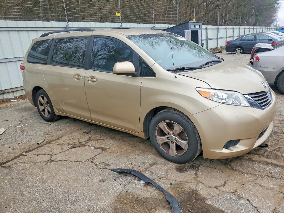 2014 Toyota Sienna VIN 5TDKK3DC7ES408069 COPART salvage auction — NORMAL WEAR, Fl - Cert Of Title Slvg Rebuildable, sold $3,000 on 2026-07-31 (photo 4)