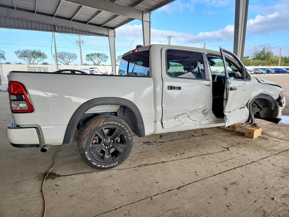 2023 Ram 1500 VIN 1C6RRFFG8PN701331 COPART salvage auction — SIDE, Fl - Cert Of Title Slvg Rebuildable, sold $5,900 on 2026-08-12 (photo 3)