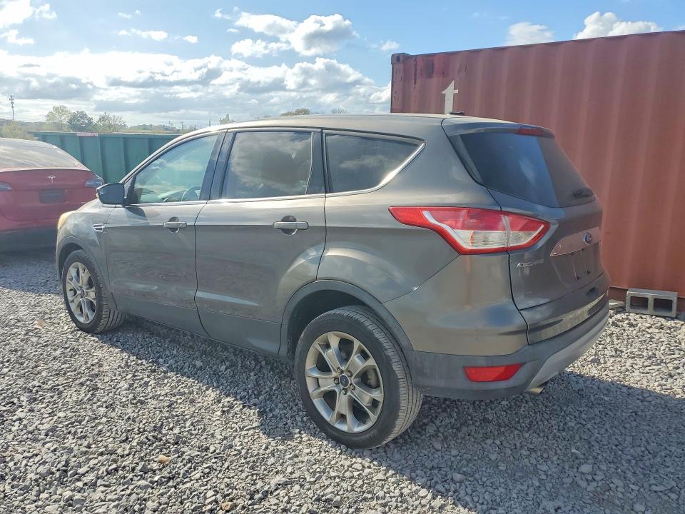 2013 Ford Escape VIN 1FMCU0HX4DUD49207 COPART salvage auction — NORMAL WEAR, Fl - Certificate Of Title (P), sold $400 on 2026-07-02 (photo 2)