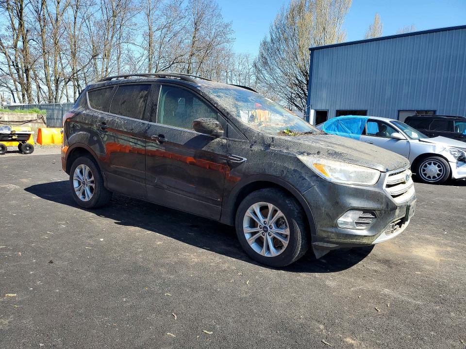 2018 Ford Escape VIN 1FMCU9GD8JUA86811 COPART salvage auction — Rear End, WV - CERTIFICATE OF TITLE, sold $475 on 2026-04-09 (photo 4)