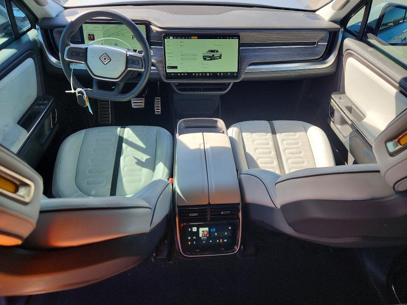 2023 Rivian R1t VIN 7FCTGAAA6PN021299 COPART salvage auction — FRONT END, TX - SALVAGE VEHICLE TITLE, sold $12,900 on 2026-07-09 (photo 8)