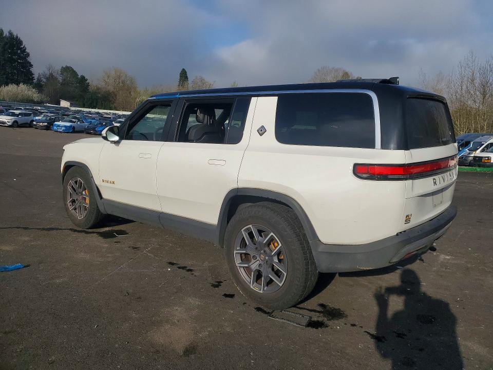 2023 Rivian R1s VIN 7PDSGABA4PN017518 COPART salvage auction — SIDE, Or - Salvage Title Certificate, sold $23,200 on 2026-07-13 (photo 2)