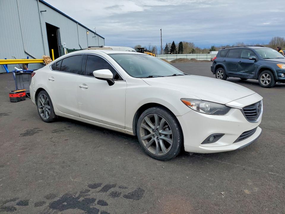 2015 Mazda VIN JM1GJ1W50F1216356 COPART salvage auction — REAR END, ID - SALVAGE CERTIFICATE OF TITLE, sold $2,050 on 2026-07-08 (photo 4)
