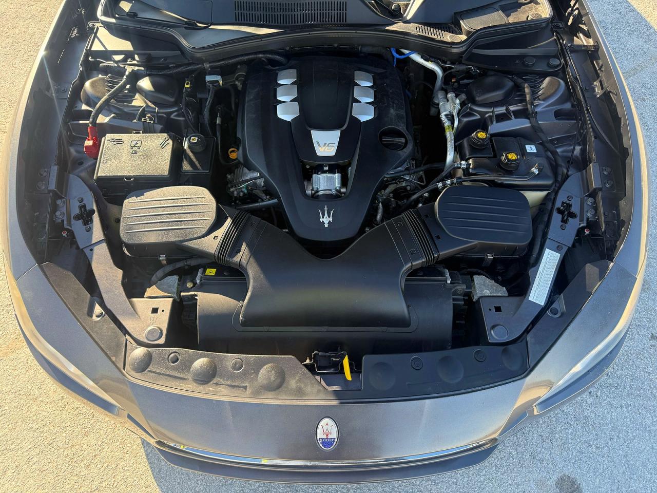 2017 Maserati Ghibli VIN ZAM57XSA9H1206127 COPART salvage auction — Damage History, Tx - Salvage Cert-Manufacturer Buyb (P), sold $25,000 on 2026-04-13 (photo 7)