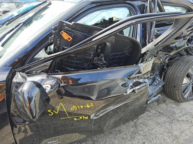 2023 Polestar 2 VIN YSMEG3KAXPL145083 COPART salvage auction — ALL OVER, CA - NON-REPAIRABLE VEHICLE CERT, sold $650 on 2026-10-02 (photo 7)