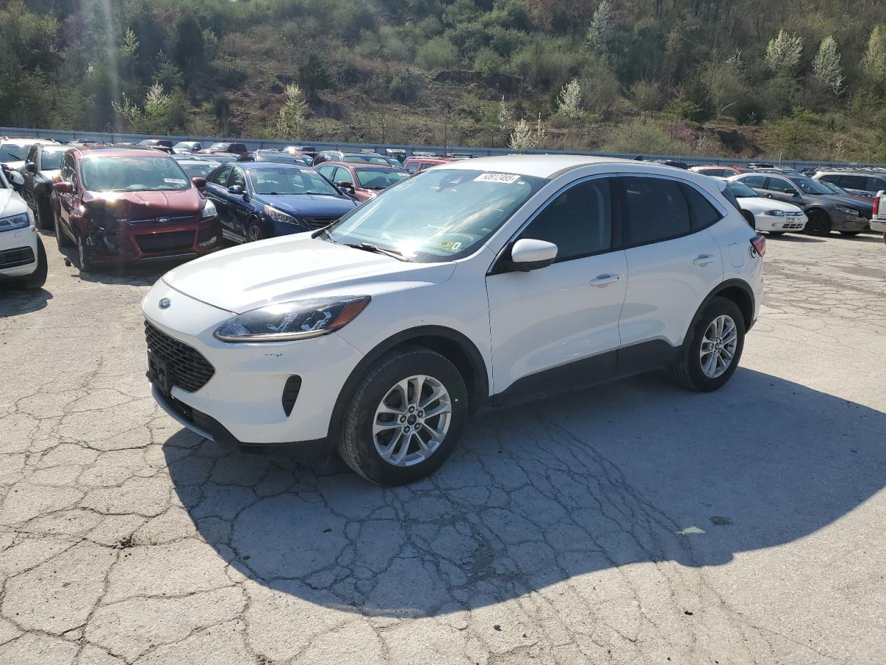 2020 Ford Escape VIN 1FMCU9G64LUA59948 COPART salvage auction — Minor Dent/Scratches, WV - CERTIFICATE OF TITLE, sold $2,350 on 2026-06-25 (photo 1)