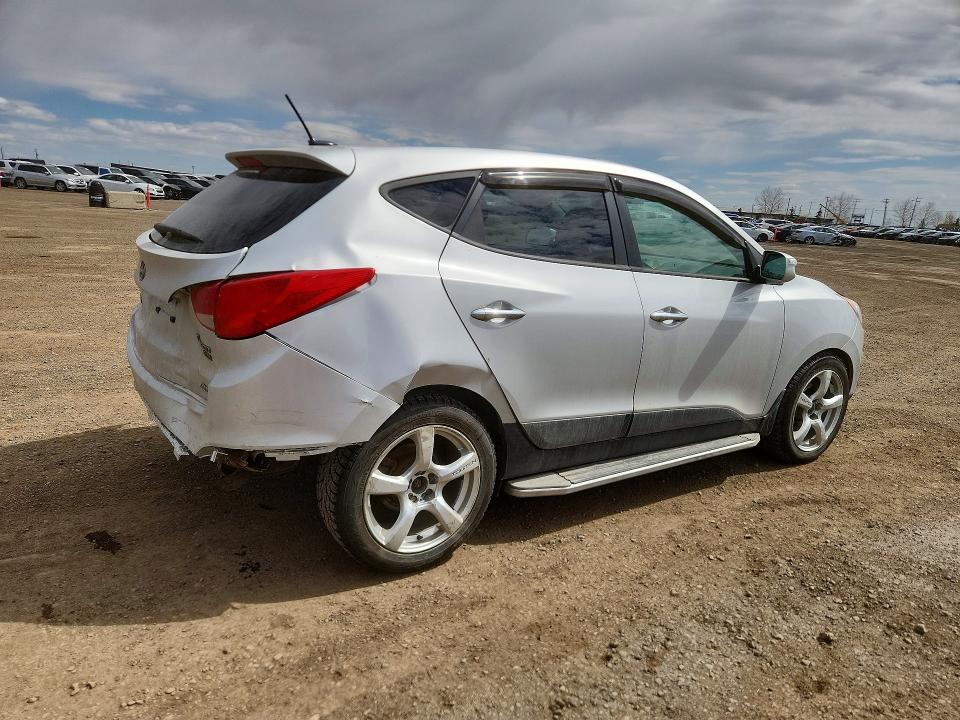 2011 Hyundai Tucson VIN KM8JUCAC0BU275328 COPART salvage auction — REAR END, AB - BOS - SALVAGE, sold $275 on 2026-07-28 (photo 3)