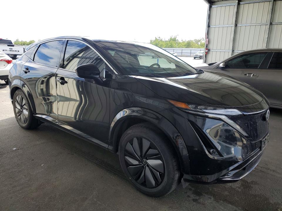 2023 Nissan Ariya VIN JN1AF0BA4PM407219 COPART salvage auction — SIDE, CA - SALVAGE CERTIFICATE, sold $7,700 on 2026-07-09 (photo 4)
