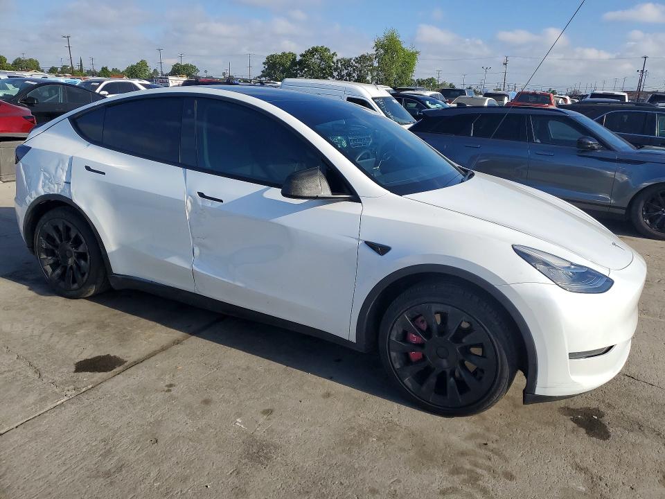 2023 Tesla Model y VIN 7SAYGDEE0PA052489 COPART salvage auction — REAR END, Ca - Salvage Certificate, sold $14,300 on 2026-07-29 (photo 4)