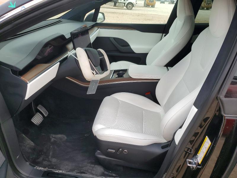 2023 Tesla Model x VIN 7SAXCBE52PF423179 COPART salvage auction — FRONT END, TX - CERTIFICATE OF TITLE, sold $17,300 on 2026-07-30 (photo 7)