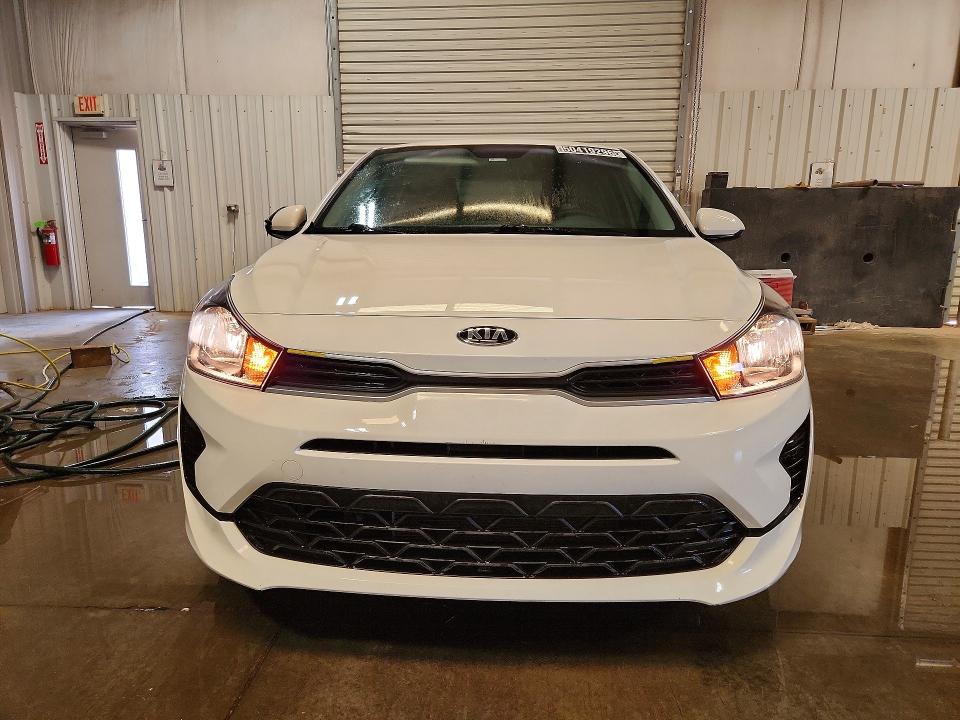 2021 Kia Rio VIN 3KPA24AD0ME378954 COPART salvage auction — REAR END, Wv - Certificate Of Title, sold $2,650 on 2026-07-09 (photo 5)