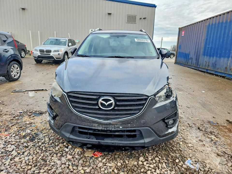 2016 Mazda Cx-5 VIN JM3KE2CY4G0770260 COPART salvage auction — FRONT END, Wi - Certificate Of Title, sold $2,850 on 2026-07-06 (photo 5)